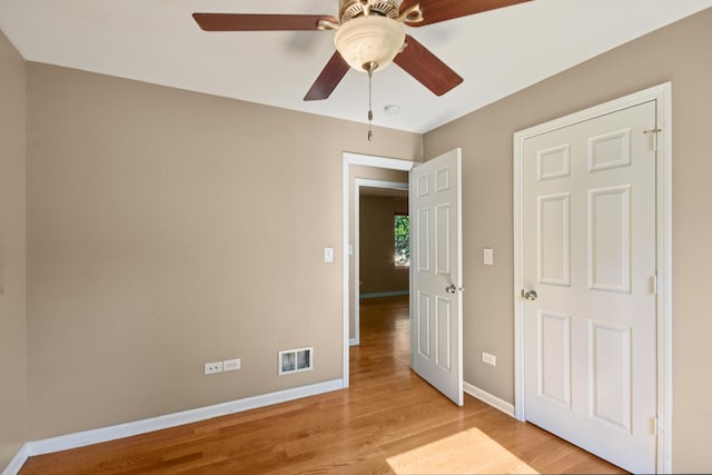 357 Sword Way, Bolingbrook, IL 60440 - unfurnished bedroom featuring light wood-style floors and ceiling fan