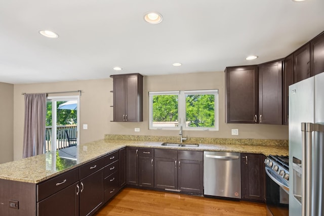 357 Sword Way, Bolingbrook, IL 60440 - kitchen featuring stainless steel appliances, a peninsula, open shelves, dark brown cabinetry, and recessed lighting