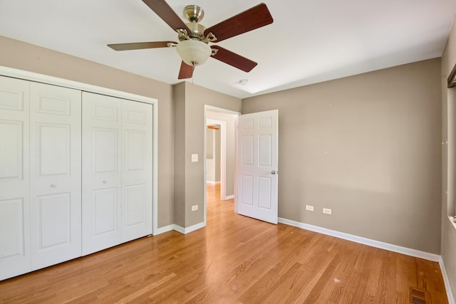 357 Sword Way, Bolingbrook, IL 60440 - unfurnished bedroom featuring light wood-type flooring, a closet, and ceiling fan