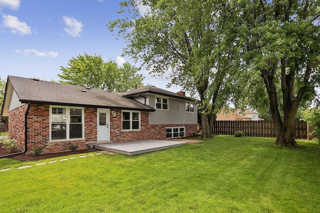 232 S Walnut St, Glenwood, IL 60425 - back of house with brick siding, a deck, a chimney, and a shingled roof
