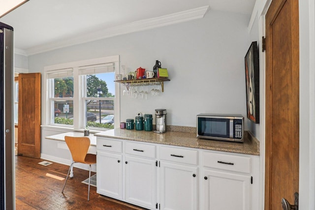 837 Wesley Ave, Oak Park, IL 60304 - kitchen with stainless steel microwave, ornamental molding, white cabinets, dark wood-style flooring, and open shelves