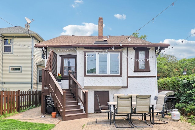 837 Wesley Ave, Oak Park, IL 60304 - back of property with stucco siding, a patio area, and a chimney