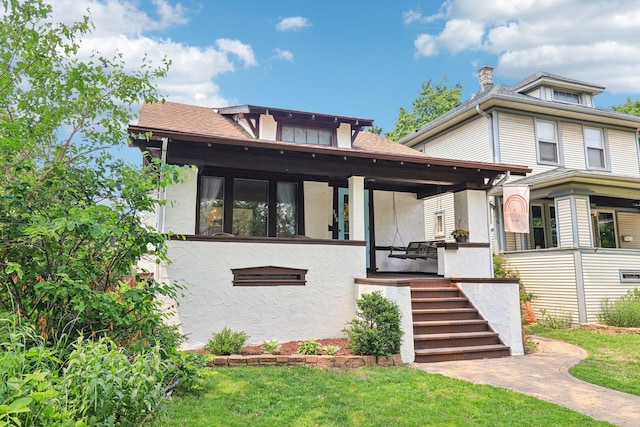837 Wesley Ave, Oak Park, IL 60304 - american foursquare style home with stucco siding, a porch, and stairs
