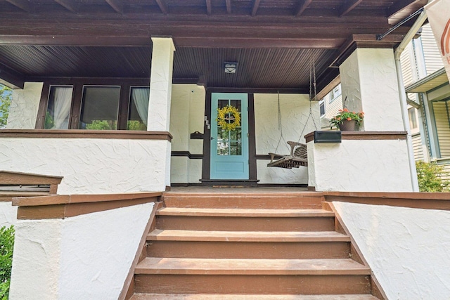 837 Wesley Ave, Oak Park, IL 60304 - doorway to property featuring stucco siding and a porch