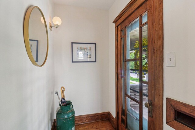 837 Wesley Ave, Oak Park, IL 60304 - doorway featuring baseboards and wood finished floors