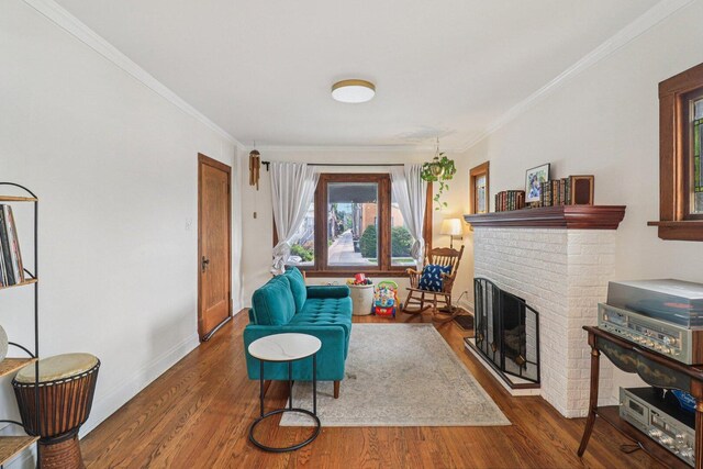 837 Wesley Ave, Oak Park, IL 60304 - living area featuring ornamental molding, wood finished floors, and a brick fireplace