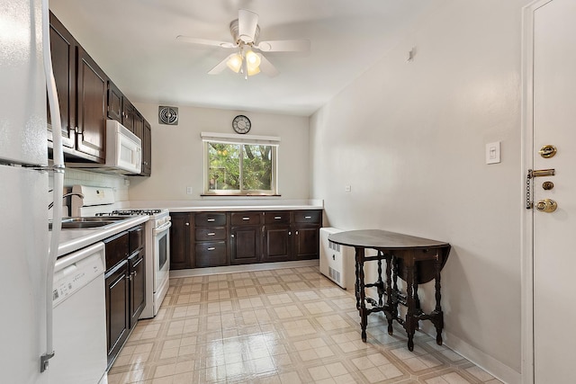 2620 Central Dr Unit 2S, Flossmoor, IL 60422 - kitchen featuring white appliances, light floors, dark brown cabinets, ceiling fan, and light countertops