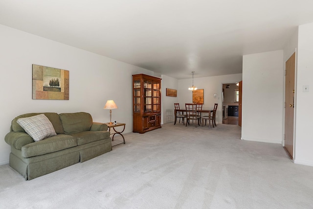 2620 Central Dr Unit 2S, Flossmoor, IL 60422 - living room featuring light colored carpet and a chandelier