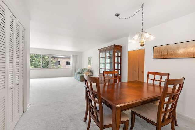 2620 Central Dr Unit 2S, Flossmoor, IL 60422 - dining area with light colored carpet and a chandelier