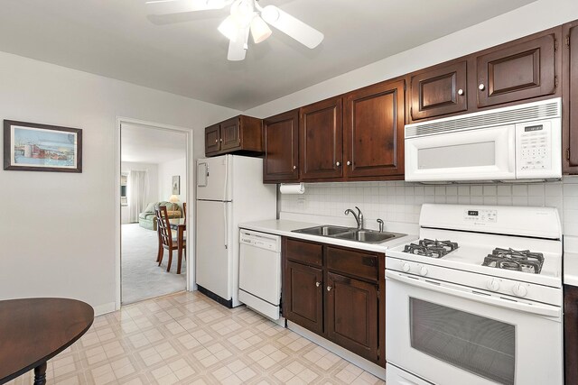 2620 Central Dr Unit 2S, Flossmoor, IL 60422 - kitchen featuring white appliances, light floors, light countertops, and dark brown cabinets