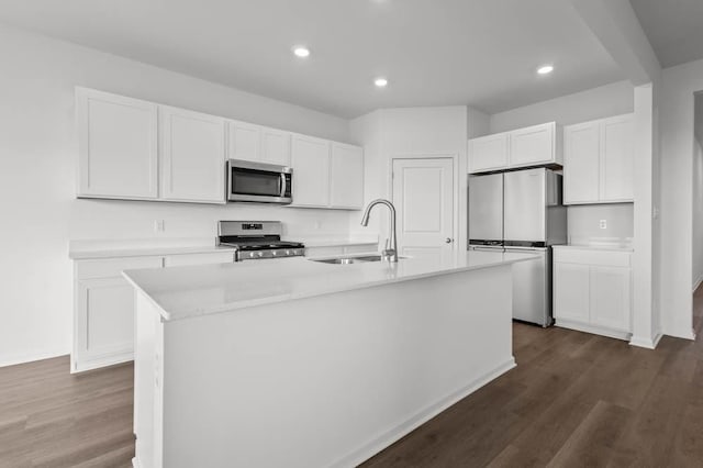 9900 Humbolt St, Huntley, IL 60142 - kitchen with appliances with stainless steel finishes, dark wood-style floors, white cabinets, and recessed lighting