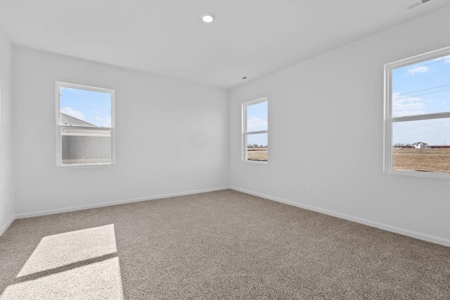 9900 Humbolt St, Huntley, IL 60142 - carpeted empty room with baseboards and recessed lighting