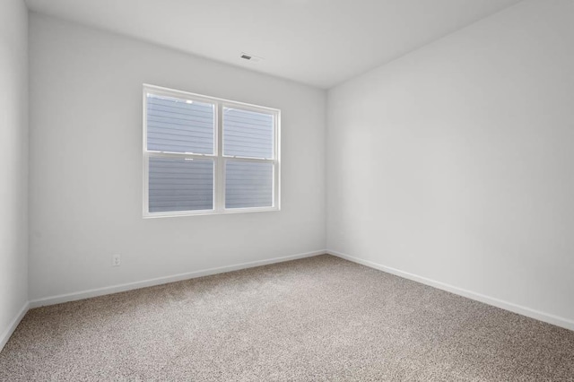 9900 Humbolt St, Huntley, IL 60142 - carpeted empty room featuring baseboards