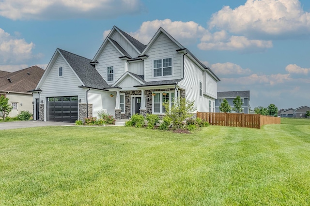 25320 W Alison Rd, Plainfield, IL 60586 - craftsman-style home featuring a garage, asphalt driveway, covered porch, stone siding, and board and batten siding