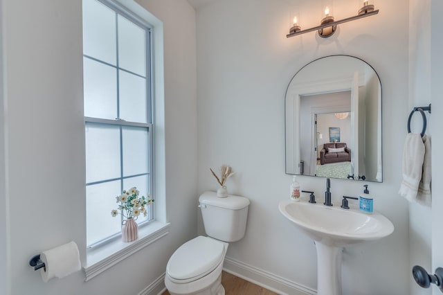 25320 W Alison Rd, Plainfield, IL 60586 - half bath featuring baseboards and wood finished floors