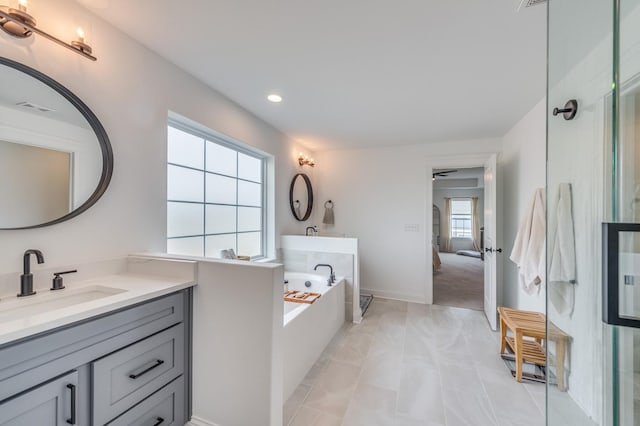 25320 W Alison Rd, Plainfield, IL 60586 - bathroom featuring a bath, vanity, recessed lighting, a shower with door, and marble finish flooring