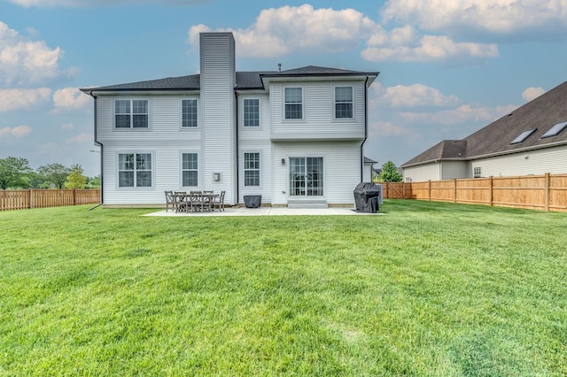 25320 W Alison Rd, Plainfield, IL 60586 - back of house with a chimney, a patio, and a fenced backyard