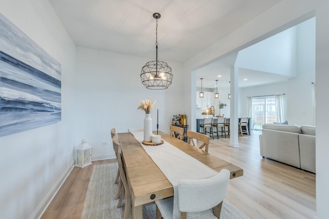 25320 W Alison Rd, Plainfield, IL 60586 - dining space with light wood finished floors, a chandelier, and recessed lighting