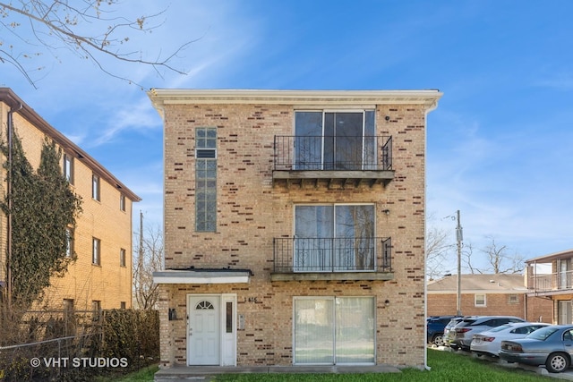 1415 W 123rd St, Calumet Park, IL 60827 - view of front of property featuring a balcony and brick siding