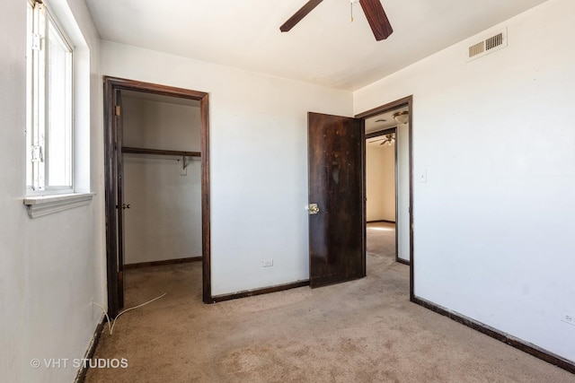 1415 W 123rd St, Calumet Park, IL 60827 - unfurnished bedroom featuring light carpet, a closet, and ceiling fan