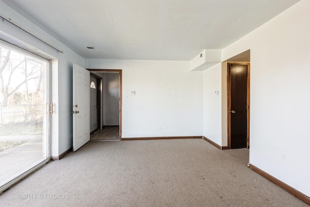 1415 W 123rd St, Calumet Park, IL 60827 - carpeted spare room featuring baseboards