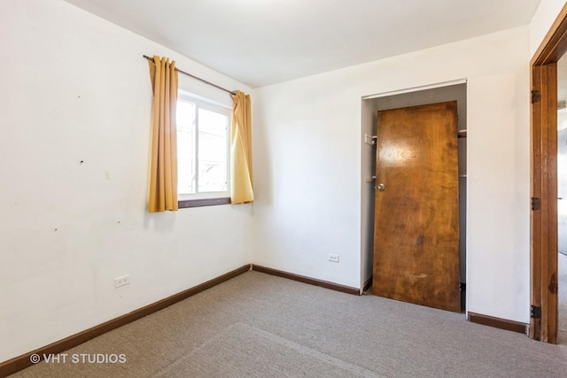 1415 W 123rd St, Calumet Park, IL 60827 - spare room featuring carpet flooring and baseboards