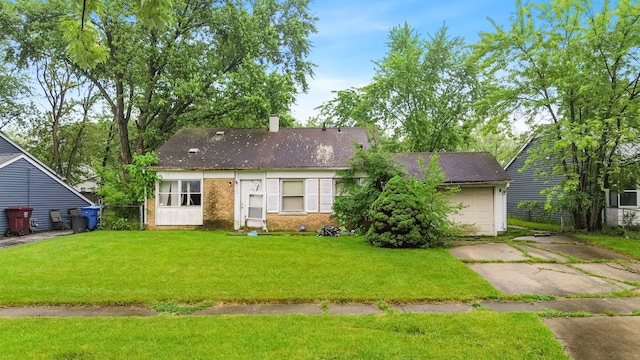 2124 218th St, Sauk Village, IL 60411 - view of front of home featuring driveway, brick siding, a chimney, a front yard, and an attached garage