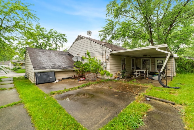 2124 218th St, Sauk Village, IL 60411 - rear view of property with a patio