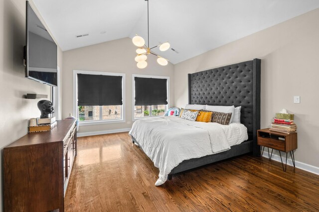 4741 S Drexel Blvd, Chicago, IL 60615 - bedroom with a chandelier, wood finished floors, and high vaulted ceiling