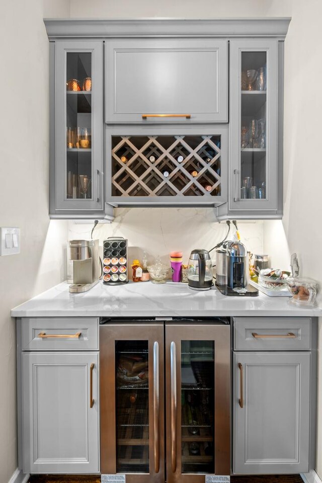4741 S Drexel Blvd, Chicago, IL 60615 - indoor wet bar featuring wine cooler and decorative backsplash