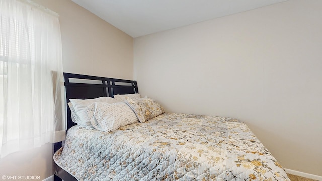 354 Millard Ave, Crystal Lake, IL 60014 - bedroom featuring baseboards and carpet