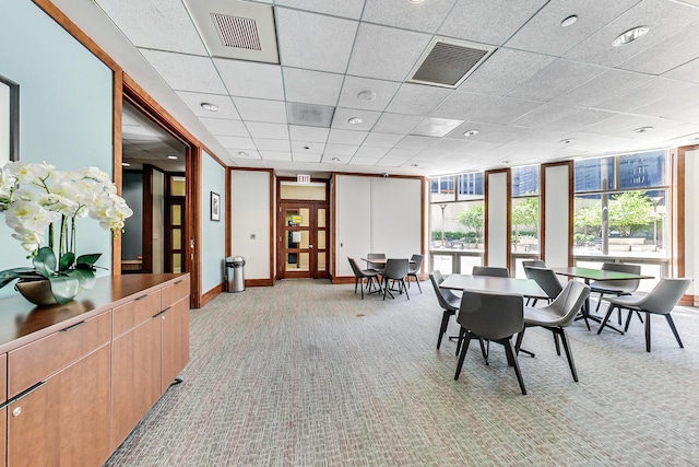 222 N Columbus Dr Unit 1405, Chicago, IL 60601 - dining space featuring light colored carpet, expansive windows, and a drop ceiling