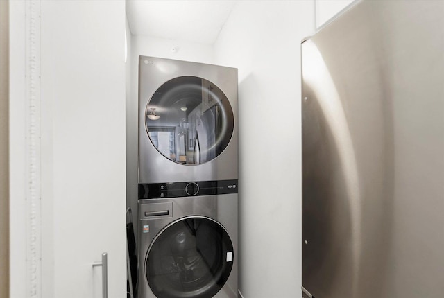 222 N Columbus Dr Unit 1405, Chicago, IL 60601 - washroom featuring estacked washer and dryer