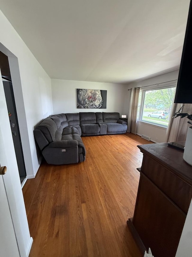 3033 189th St, Lansing, IL 60438 - living room featuring wood finished floors and baseboards