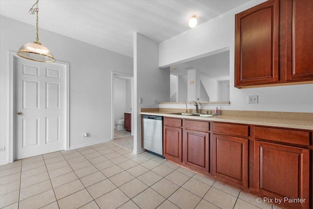 609 Cary Woods Cir, Cary, IL 60013 - kitchen featuring stainless steel dishwasher, light countertops, pendant lighting, and light tile patterned floors