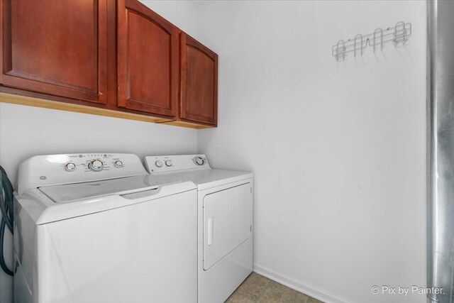 609 Cary Woods Cir, Cary, IL 60013 - laundry room featuring cabinet space and separate washer and dryer