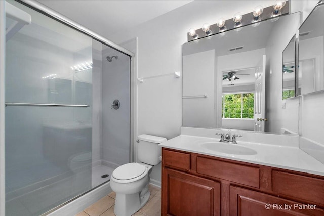 609 Cary Woods Cir, Cary, IL 60013 - full bathroom with a stall shower, tile patterned flooring, vanity, and a ceiling fan