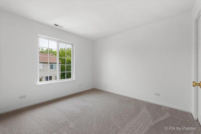 609 Cary Woods Cir, Cary, IL 60013 - carpeted spare room with baseboards