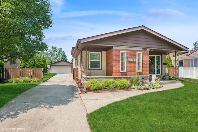 10824 Lavergne Ave, Oak Lawn, IL 60453 - view of front of home with an outdoor structure, a garage, and brick siding
