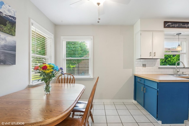 10824 Lavergne Ave, Oak Lawn, IL 60453 - dining room featuring plenty of natural light, a ceiling fan, and light tile patterned floors
