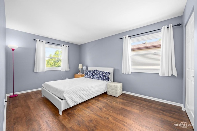 209 Surrey Dr, Carol Stream, IL 60188 - bedroom with baseboards and wood finished floors