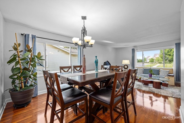 209 Surrey Dr, Carol Stream, IL 60188 - dining room featuring a chandelier and wood finished floors