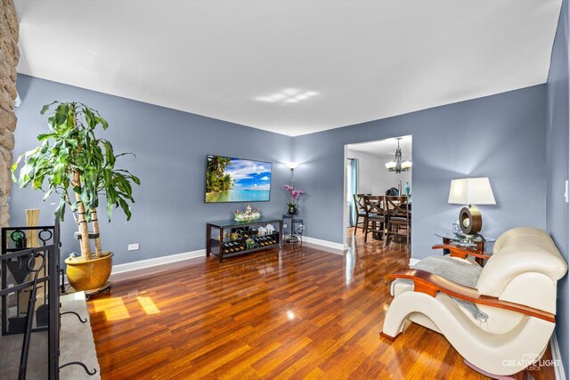 209 Surrey Dr, Carol Stream, IL 60188 - living area with wood finished floors and a chandelier