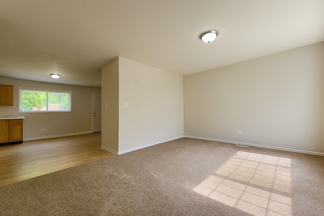 2313 Joppa Ave, Zion, IL 60099 - empty room featuring light carpet and baseboards