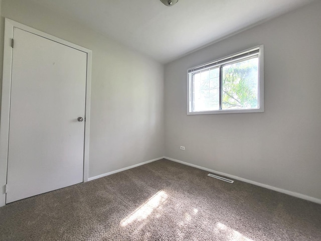 2313 Joppa Ave, Zion, IL 60099 - unfurnished bedroom featuring carpet and baseboards