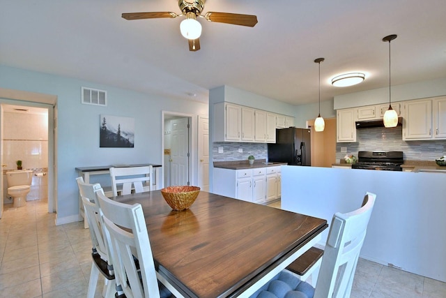 1340 Charger Ct, Carol Stream, IL 60188 - dining room featuring light tile patterned floors and a ceiling fan