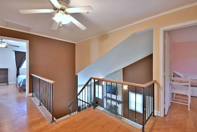 1340 Charger Ct, Carol Stream, IL 60188 - stairs featuring ceiling fan, wood finished floors, and ornamental molding
