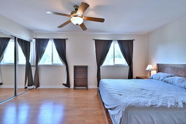 1340 Charger Ct, Carol Stream, IL 60188 - bedroom featuring light wood-style flooring and a ceiling fan