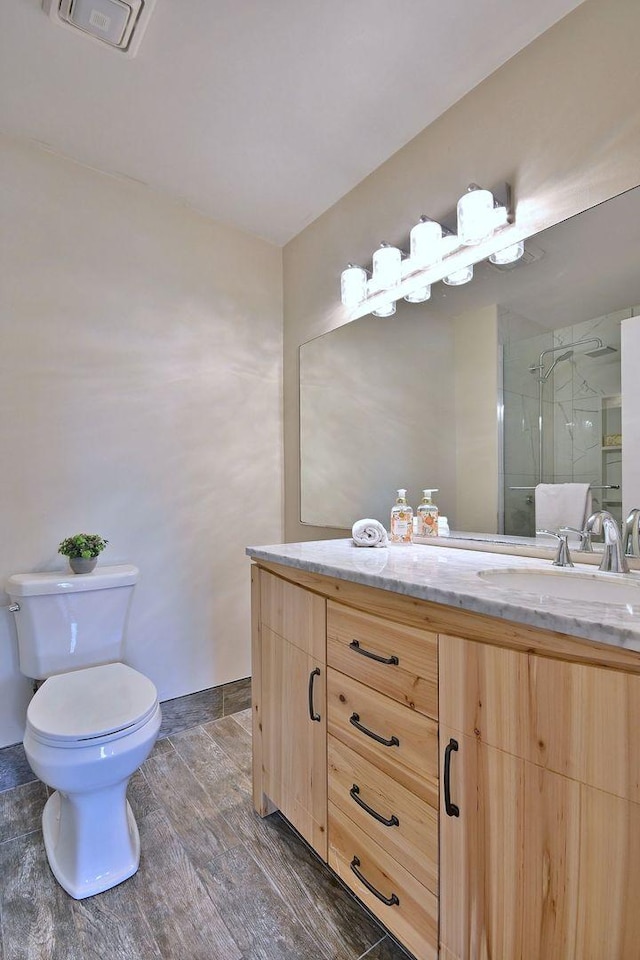 1340 Charger Ct, Carol Stream, IL 60188 - full bathroom with wood finished floors, vanity, and a shower stall