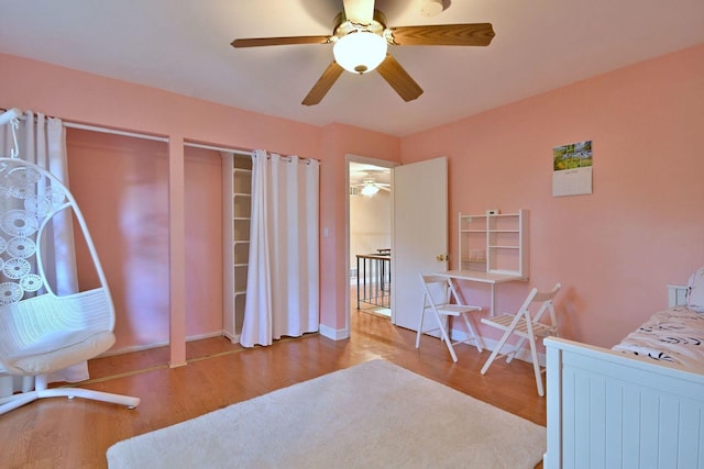 1340 Charger Ct, Carol Stream, IL 60188 - bedroom with wood finished floors, a ceiling fan, and multiple closets